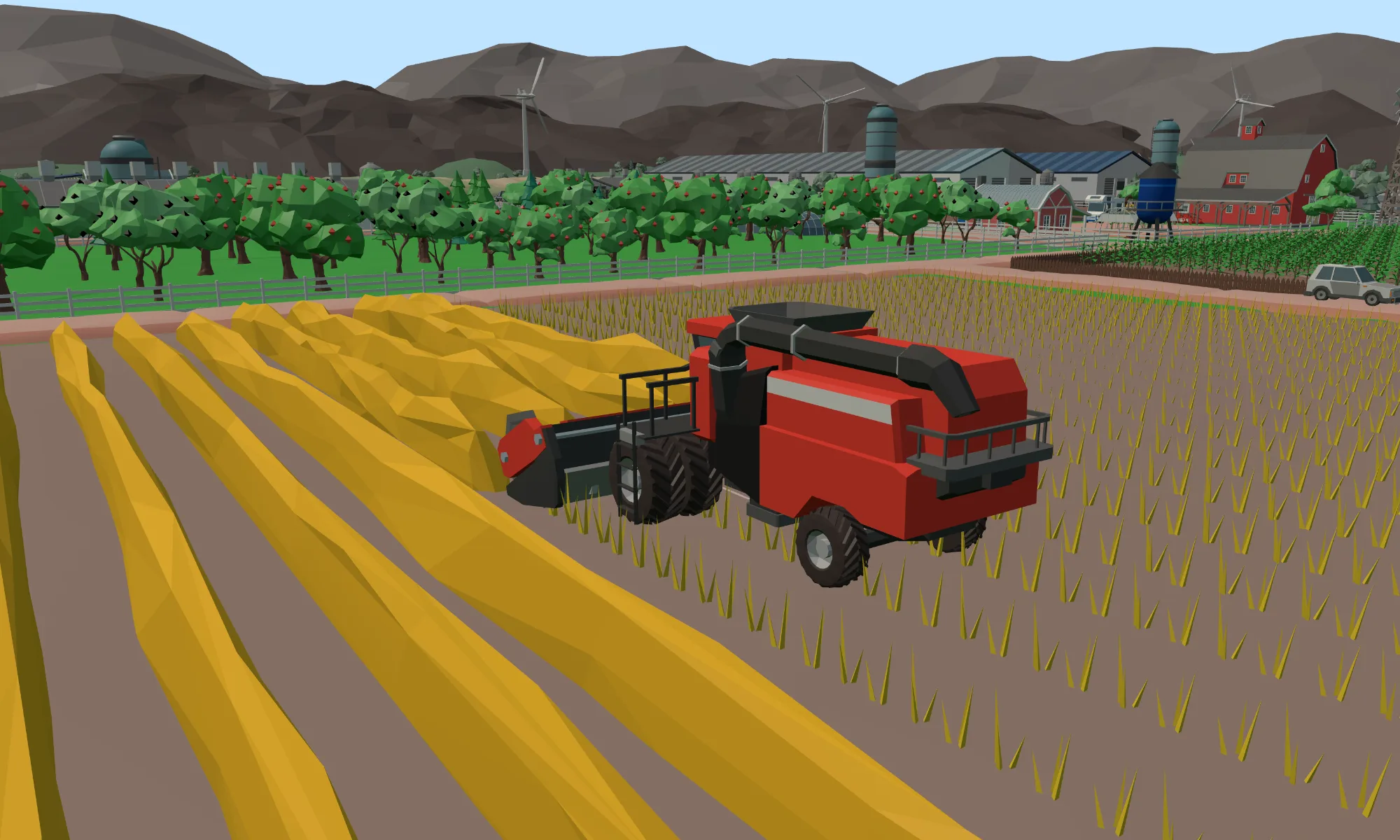 A combine harvester cutting a wide strip through a ripe golden grain field.